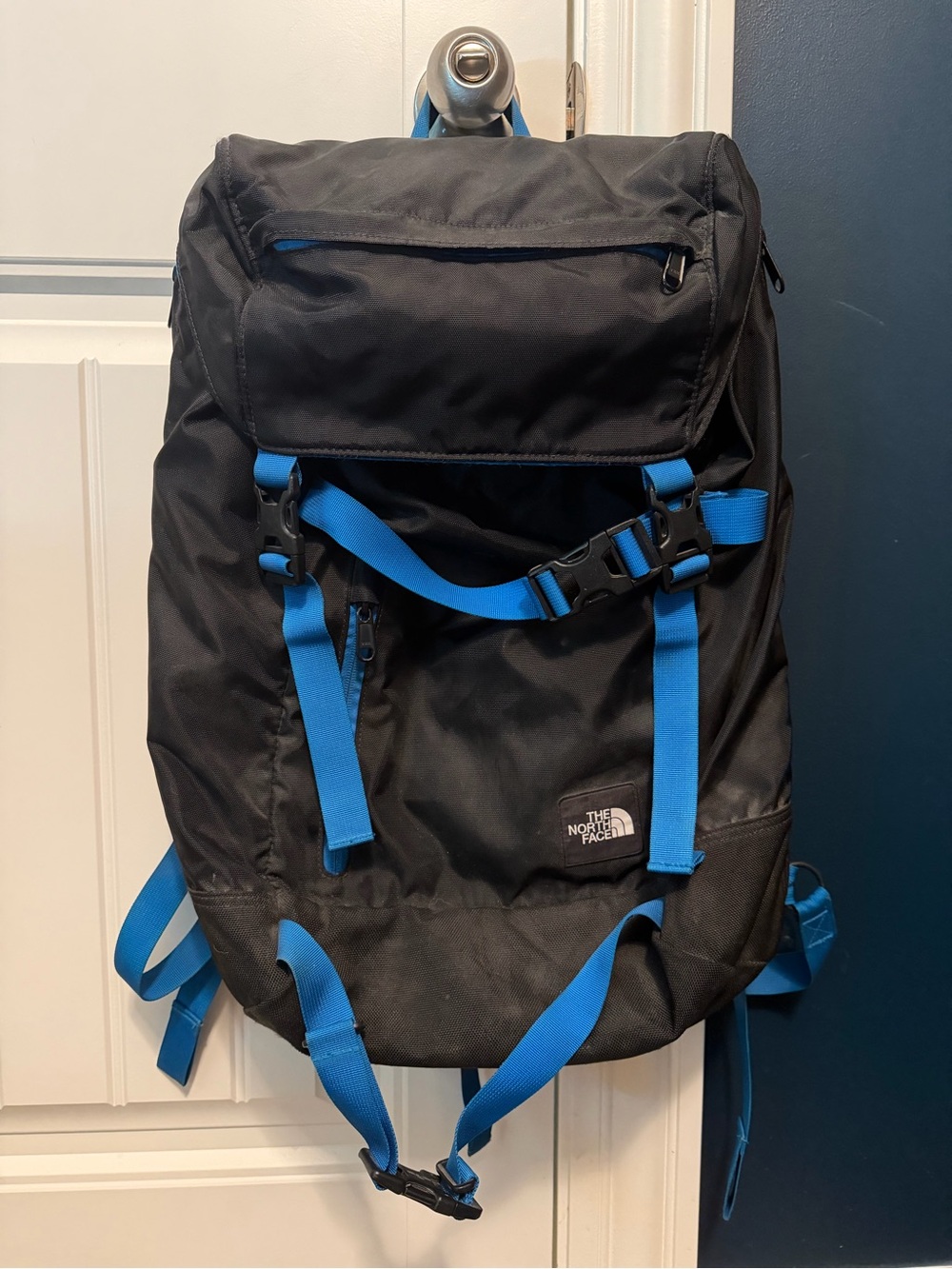 The North Face Black Backpack with Blue Straps
